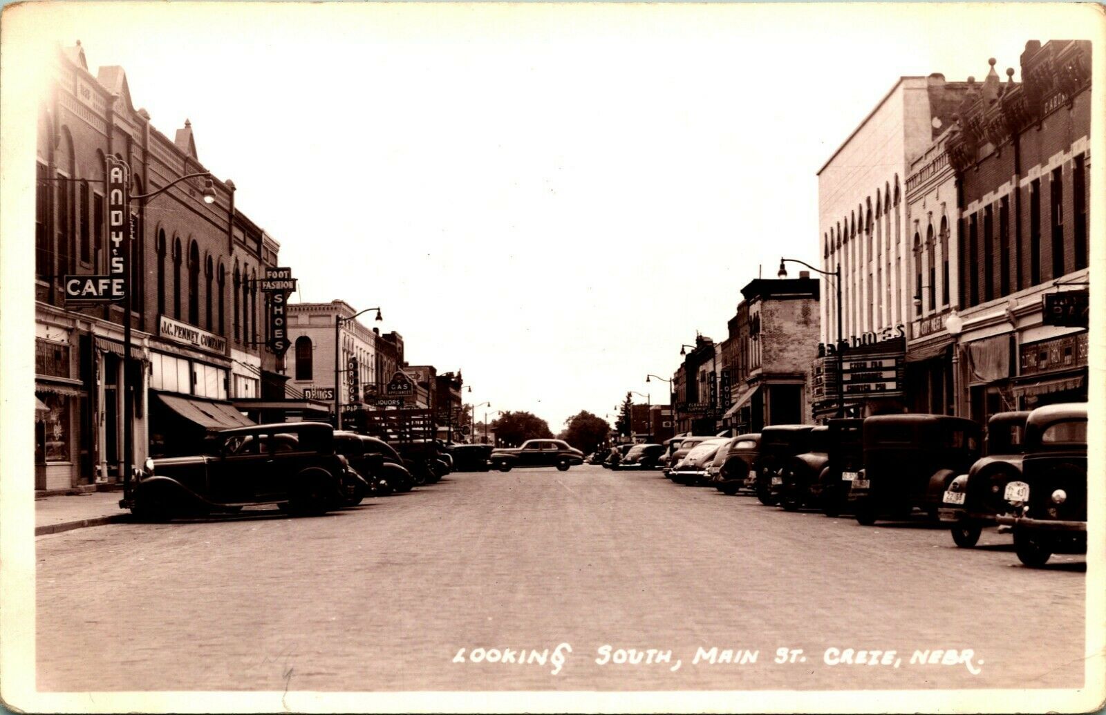 RPPC Cars on Main Street Looking South Crete Nebraska NE 1920s UNP