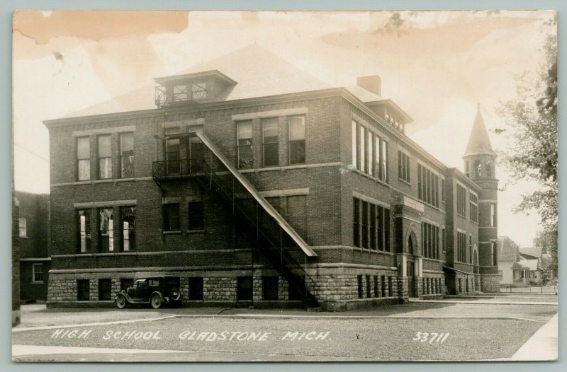 Gladstone MichiganHigh School1920s Car Under 2nd Story Fire Escape
