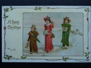 A HAPPY CHRISTMAS Wintery Scene Girls in Muffs & Boy with Lantern c1904 Postcard