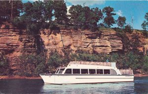 Tourist Boat passing Cow in the Milk Bottle Formation - Wisconsin Dells
