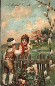 PFB No 6782 Easter Little Boy and Girl Eggs Lambs Embossed c1910 Postcard