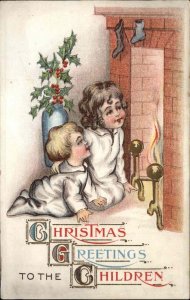 Christmas Little Girl and Boy Cute Kids Wait for Santa Claus c1910 Postcard