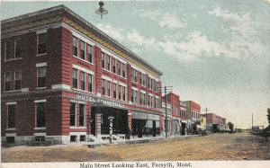 H99/ Forsyth Montana Postcard c1910 Main Street Hotel Commercial 78