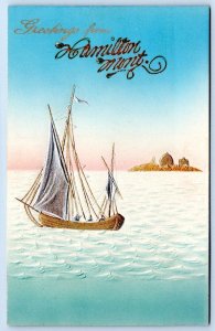 GREETINGS FROM HAMILTON MONTANA ANTIQUE AIRBRUSHED POSTCARD EMBOSSED SAILBOAT