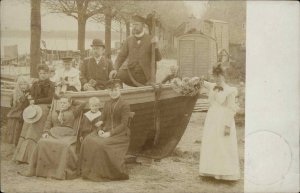 Family Posing Boat on Land Captain w/ Anchor Hamburg Germany Cancel RPPC