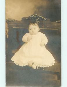 Pre-1918 rppc BABY IN WHITE DRESS AT STUDIO Dunkirk New York NY r7011