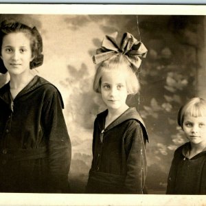 c1910s 3 Cute Little Girls RPPC Sisters Real Photo Postcard Children Artura A45