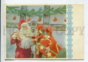 429447 ESTONIA New SANTA TV performance Christmas tree 1992 RPPC advertising