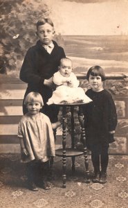 Vintage Postcard Siblings Boy & Girls Older Brother & Her Cute Little Sisters