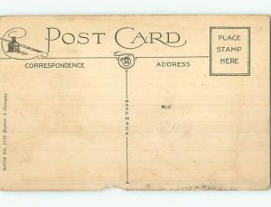 Chipped 1920's Easter BUNNY RABBIT SITS BY THE COLORED EGGS o6054