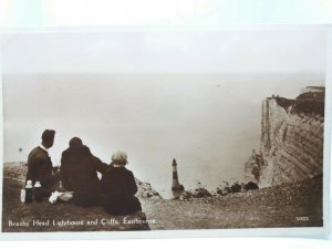 Family Enjoying a Picnic at Beachy Head Lighthouse Eastbourne RP Postcard 1939
