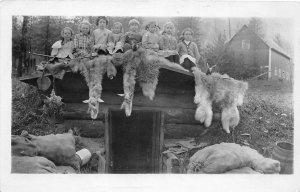 H58/ Noxon Montana RPPC Postcard c1910 Animal Furs Kids Root Cellar