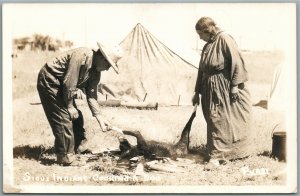 AMERICAN INDIANS SIOUX COOKING A DOG ANTIQUE REAL PHOTO POSTCARD RPPC