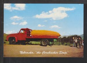 Exagrerated Corn in Truck Postcard 