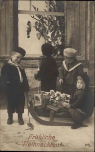 German Christmas - Children Toys Decorated Tree c1910 Real Photo Postcard