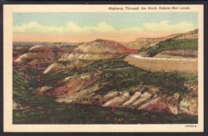 Highway Through the ND Badlands Postcard 4660