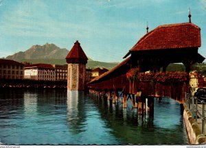 Switzerland Luzern Chapel Bridge With Water Tower and Pilatus