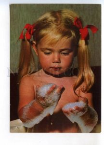 487011 Yugoslavia little girl with pigtails plays with foam in the bath postcard