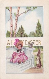 EASTER, 1900-10s; Toddler wearing bonnet sitting on couch with squirrel & rabbit