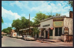 New Mexico ALBUQUERQUE South Side of Plaza Old Town 1950s cars and Store Front