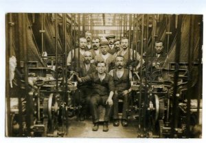 497175 UK Great Britain English workers at factory next to machines photo