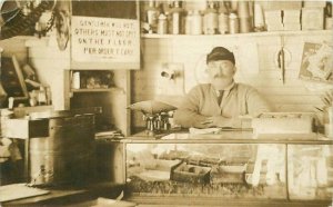 1911 East Machias Maine Store Interior Scale Owner Tobacco No spit Signage RPPC 