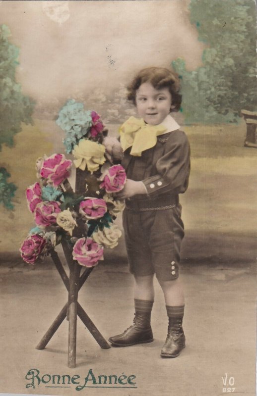 RP: NEW YEAR, PU-1913; Bonne Annee, Boy standing by Flower Stand