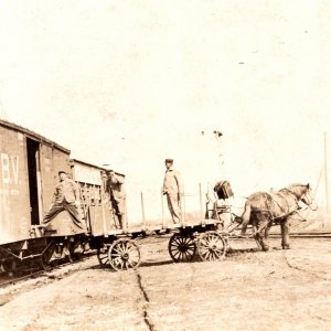 1910 RPPC Men Horse Wagon Unloading Boxcar Trinity & Brazos Valley RR Texas T&BV
