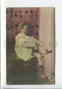 3177688 Charming Girl w/ striped socks Vintage PHOTO tinted PC