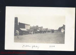 RPPC ELKTON SOUTH DAKOTA DOWNTOWN STREET SCENE PARADE REAL PHOTO POSTCARD