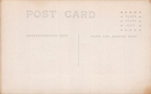 J79/ St Petersburg Florida RPPC Postcard c1910 Horse Buggy Building 126