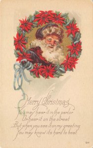 Merry Christmas Greetings Santa Claus Blue Suit Wreath ca 1910s Vintage Postcard