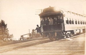 Men Riding Train Real Photo Vintage Postcard AA23512