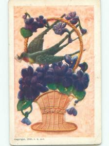 Pre-Linen LARGE BIRD SITS IN BASKET OF PURPLE FLOWERS k8599