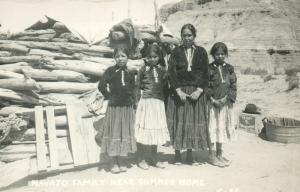 AMERICAN INDIAN NAVAJO FAMILY near SUMMER HOME ANTIQUE REAL PHOTO POSTCARD RPPC