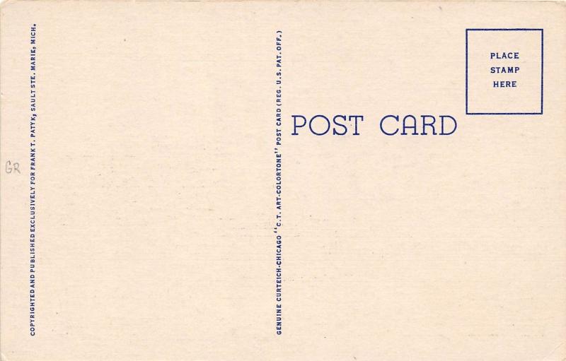 SAULT STE MARIE MI FREIGHTER DOWNWARD BOUND AT MacARUTHUR LOCK POSTCARD 1940s