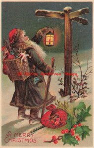 Christmas, BW No 296, Gray Robe Santa with Basket of Toys Holding Lantern