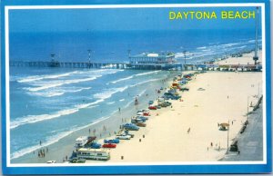 Postcard FL Daytona Beach - Amusement pier juts into the Atlantic Ocean