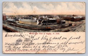 J94/ Rugby North Dakota Postcard c1910 Birdseye Railroad Stores 351