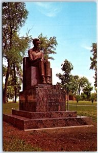 Postcard - Studious Abraham Lincoln on campus, Lincoln College - Lincoln, IL