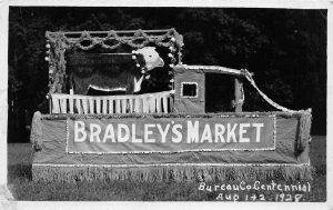 H30/ Princeton Illinois RPPC Postcard c20s Parade Float Bradley's Market Cow