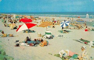 Sun Bathers On The Beach View Images 