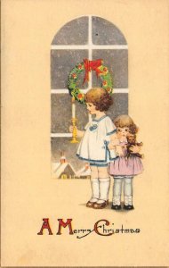 A MERRY CHRISTMAS Girls & Wreath Holiday Greetings ca 1910s Vintage Postcard