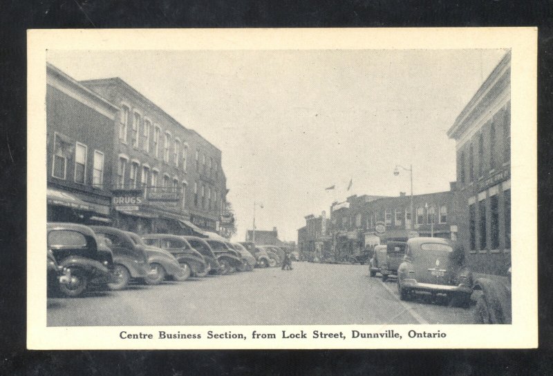 DUNNVILLE ONTARIO CANADA DOWNTOWN STREET SCENE OLD CARS VINTAGE POSTCARD