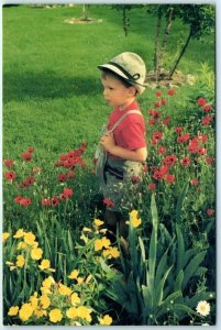 Postcard - A small boy in the Amana Colonies of Iowa