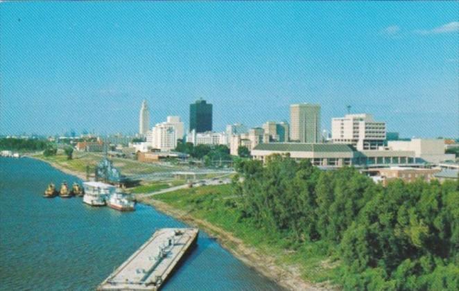 Louisiana Baton Rouge Skyline With Barges On The Mississippi River