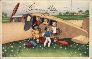 Bonne Fete French Children in Airplane Vintage Postcard