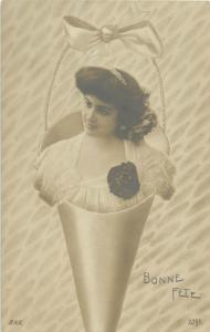 Surrealism young lady in a bascket fantasy Bonne Fete greetings photo postcard