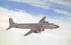 American Airlines DC-7 Plane in Flight 1950s postcard