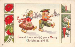 Dutch Couple Comic MERRY CHRISTMAS Windmills, Poinsettia c1910s Vintage Postcard